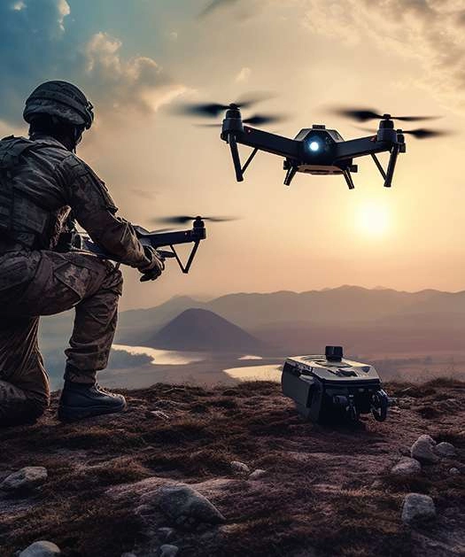 Soldier kneeling outdoors at sunset, operating a custom UAV, showcasing advanced PCB design and electronic manufacturing in defense technology.